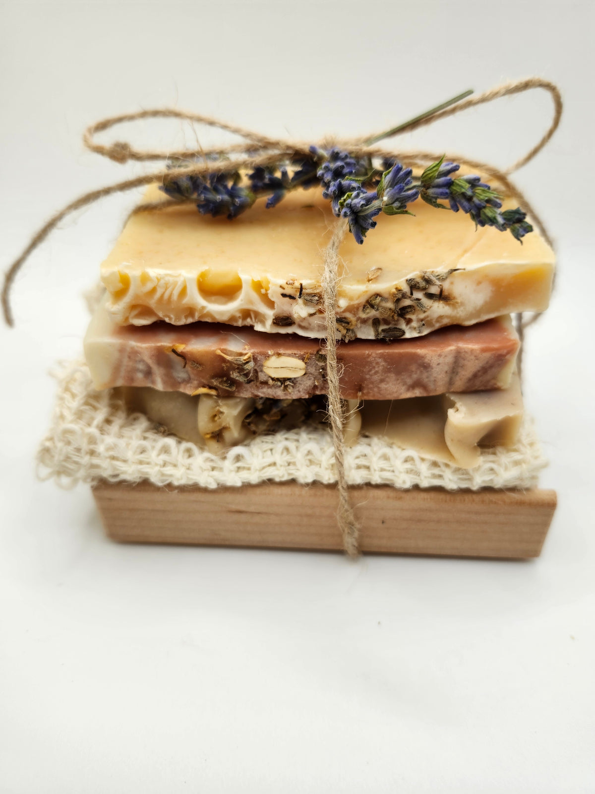 Handmade half bar soap gift set with Silky Goat, Lavender Love and Colorado Tree Hugger, sisal soap saver and red alder soap dish, tied with jute twine and lavender